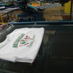 Green ink application and the curing processor the t-shirts