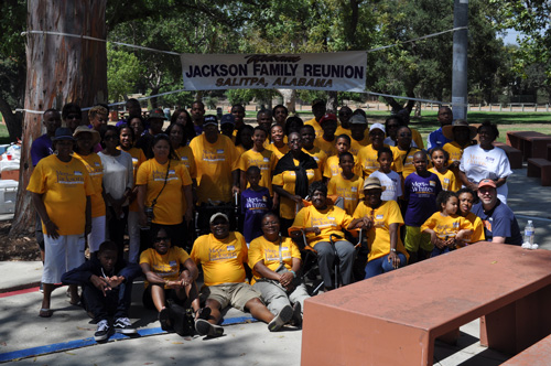 The Jackson family at their family reunion picnic wearing matching custom t-shirts